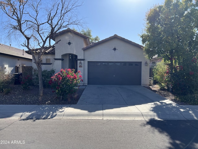 view of front of property with a garage