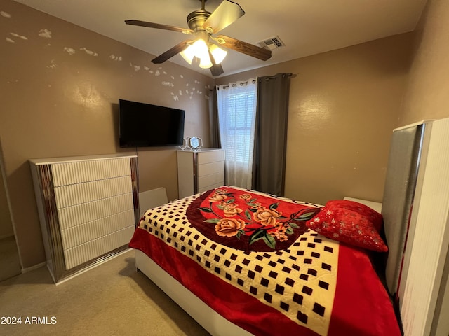 bedroom featuring carpet and ceiling fan