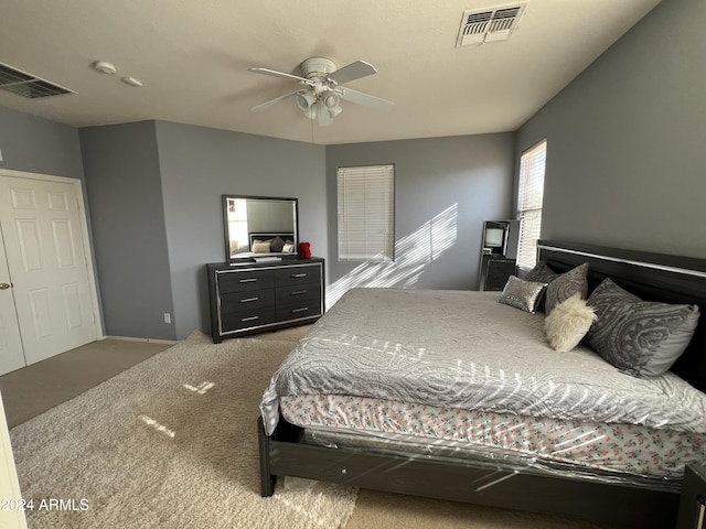 carpeted bedroom featuring ceiling fan