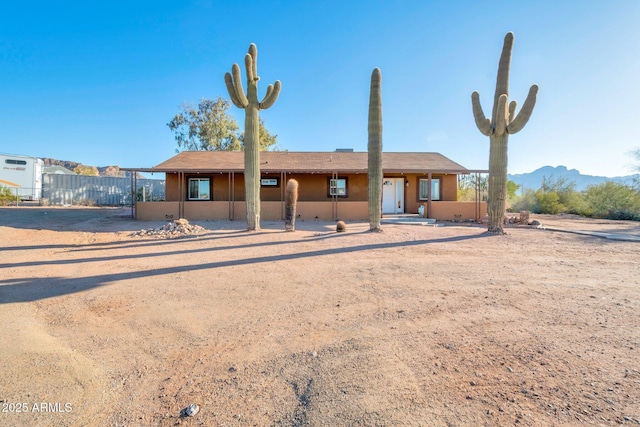 view of front of house with a mountain view