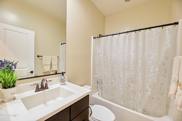 full bathroom with toilet, shower / tub combo with curtain, and vanity