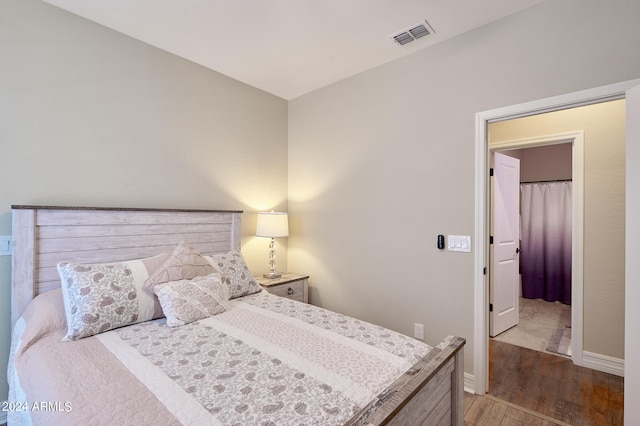 bedroom featuring light hardwood / wood-style floors