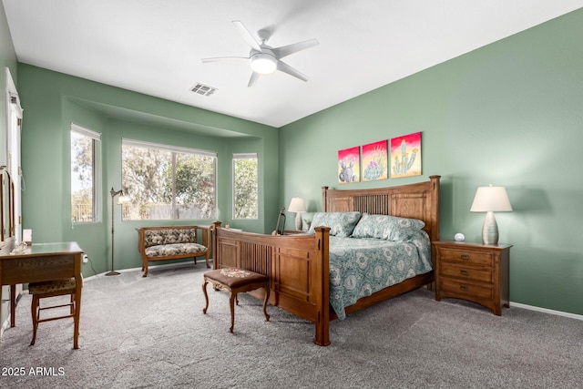 bedroom featuring carpet floors, baseboards, visible vents, and a ceiling fan