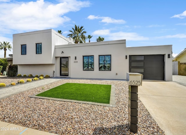 contemporary house featuring a garage