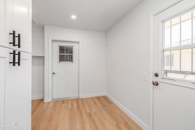 doorway featuring light wood-type flooring