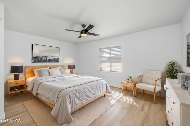 bedroom featuring light hardwood / wood-style flooring and ceiling fan