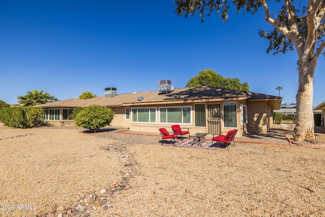 rear view of house with a patio area