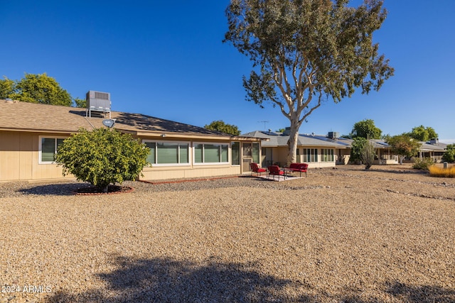 back of property with a patio area