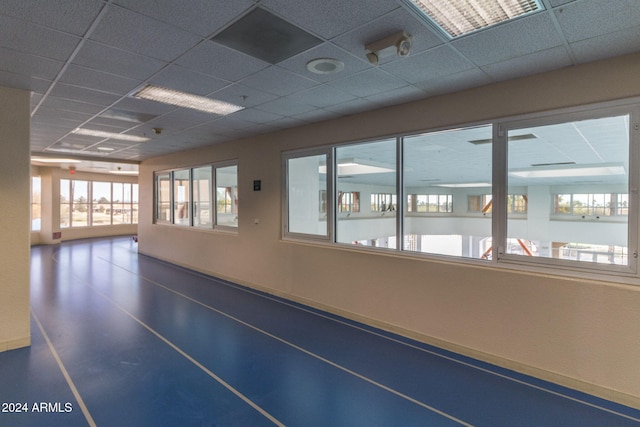 interior space featuring a paneled ceiling