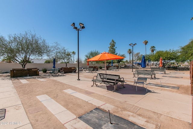 view of property's community featuring a patio