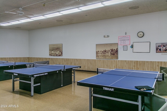 playroom with wooden walls