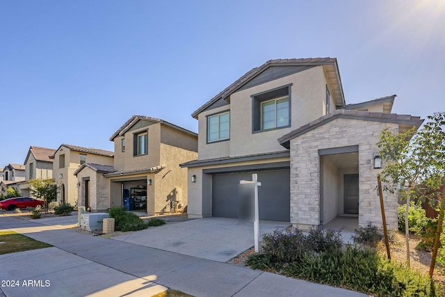 view of front of home with a garage