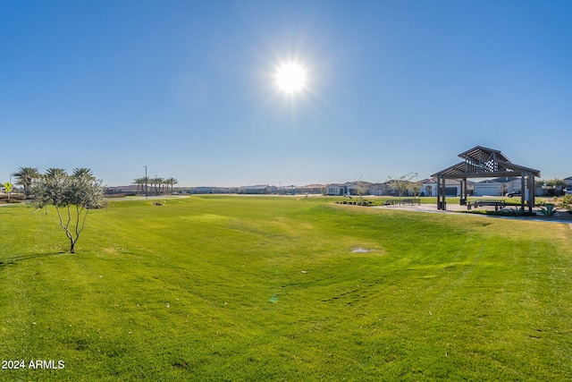 view of property's community with a gazebo and a lawn