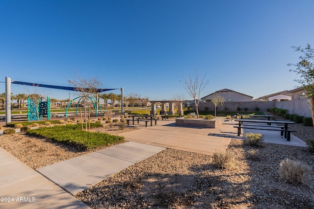 view of home's community featuring a playground