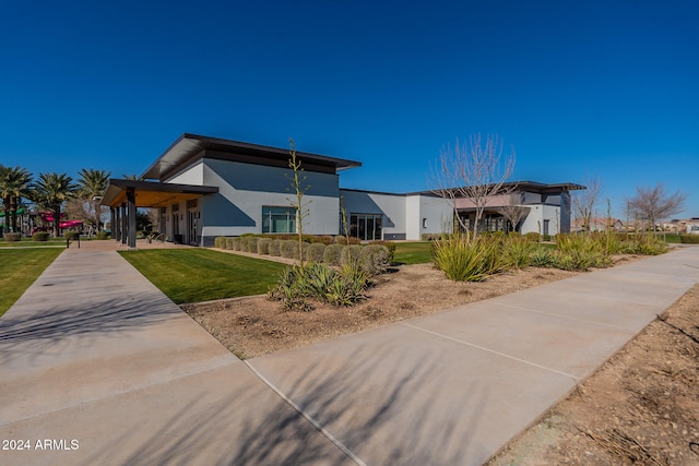 exterior space featuring a front yard