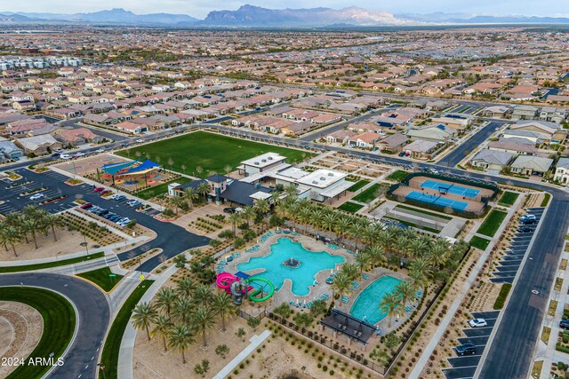 birds eye view of property featuring a mountain view