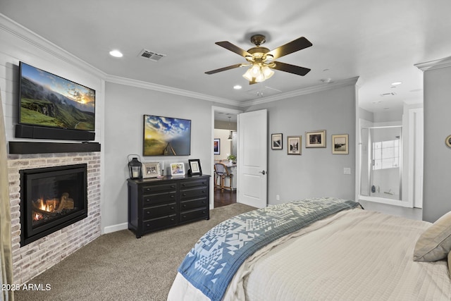 bedroom featuring a brick fireplace, carpet flooring, visible vents, and crown molding