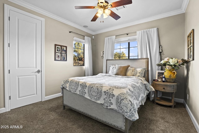 bedroom featuring baseboards, dark colored carpet, and crown molding