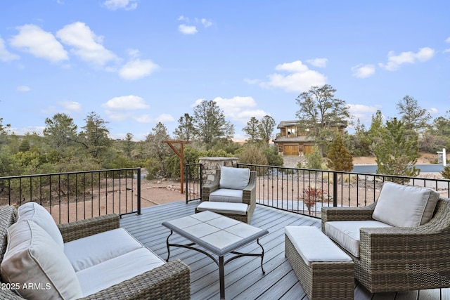 wooden terrace featuring an outdoor living space