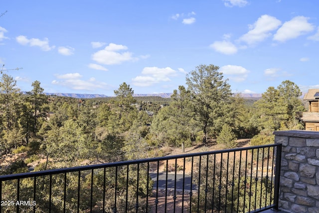 balcony featuring a mountain view