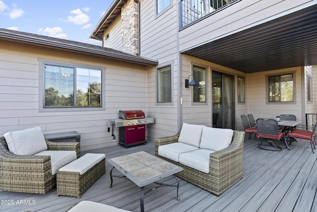 deck featuring an outdoor hangout area, outdoor dining area, and area for grilling