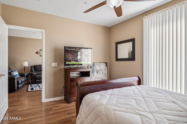 bedroom featuring wood-type flooring and ceiling fan