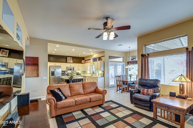 tiled living room featuring ceiling fan