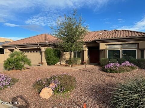 view of front of property featuring a garage