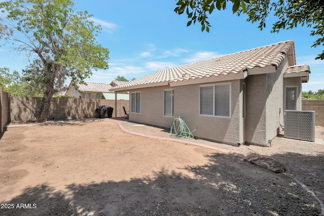 839 W Silver Creek Rd, Gilbert, AZ 85233 - rear view of house with stucco siding, a tile roof, and a fenced backyard