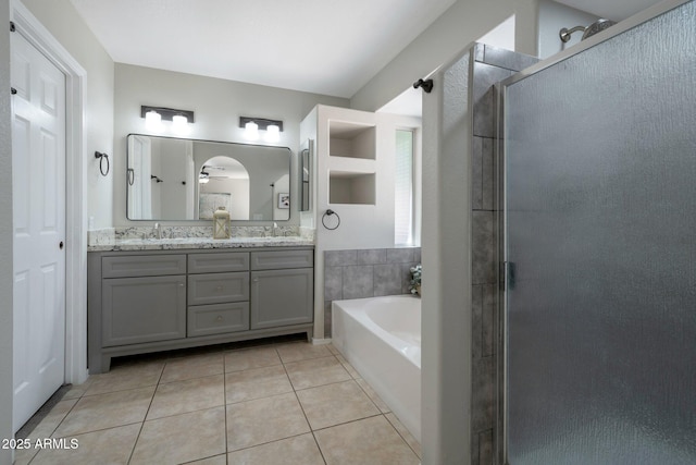 839 W Silver Creek Rd, Gilbert, AZ 85233 - bathroom featuring a shower stall, double vanity, tile patterned floors, and a garden tub