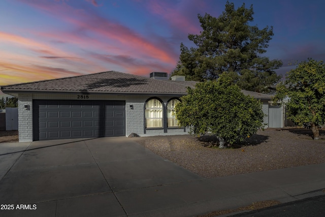 view of front of home with a garage