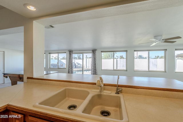 kitchen with ceiling fan, sink, and pool table