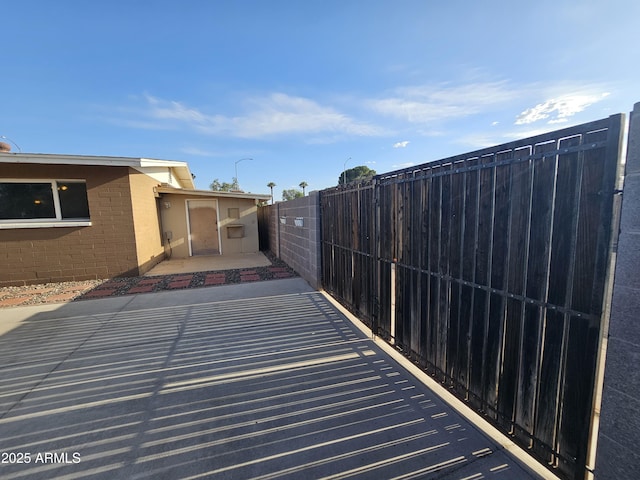 view of patio with fence