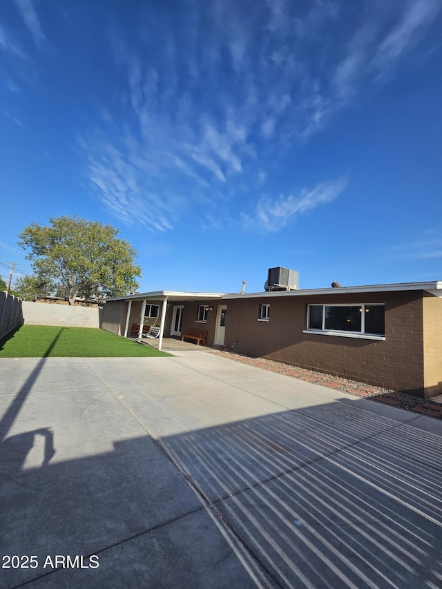 1904 E Jarvis Ave, Mesa, AZ 85204 - back of house with a patio and central air condition unit