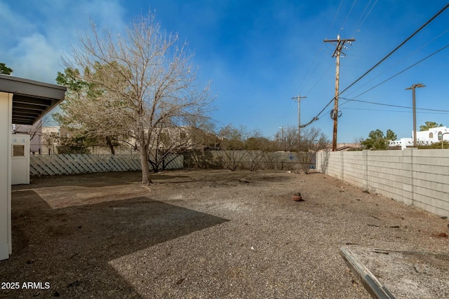 view of yard featuring a fenced backyard