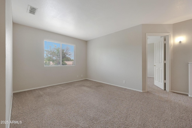 unfurnished room featuring carpet flooring