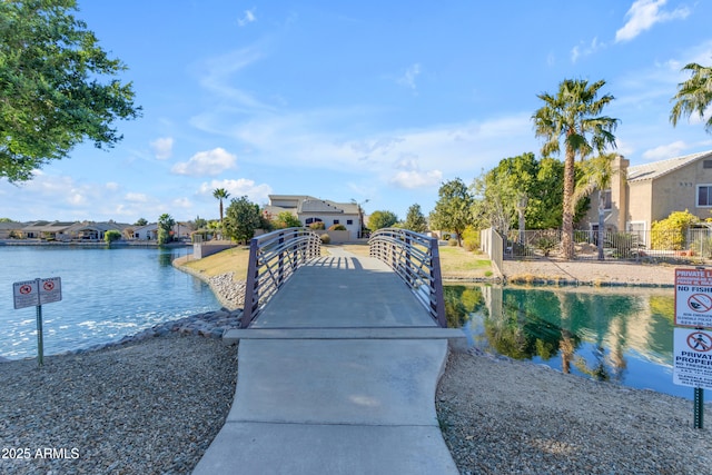 dock area with a water view