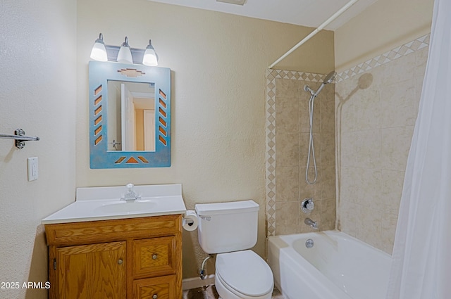 bathroom featuring toilet, a textured wall, shower / bath combo with shower curtain, and vanity