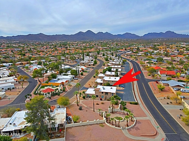 drone / aerial view with a residential view and a mountain view