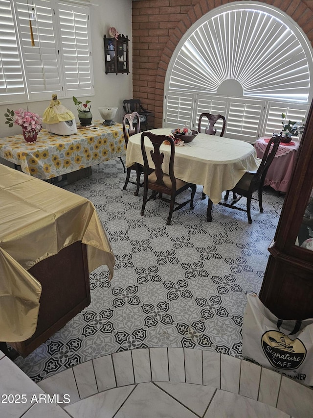 dining room with light tile patterned flooring