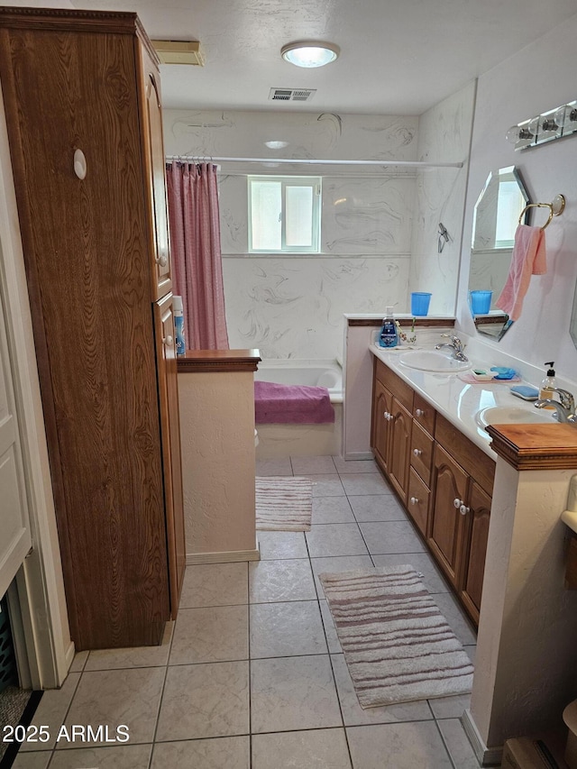 bathroom with vanity, tile patterned floors, and plus walk in shower