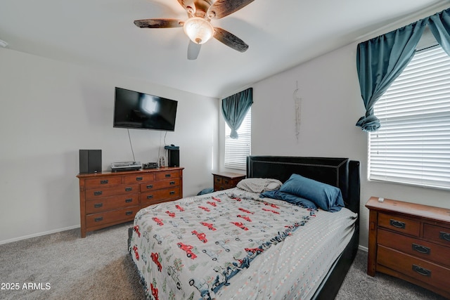 bedroom with light colored carpet and ceiling fan