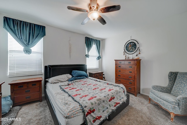 bedroom with light colored carpet and ceiling fan