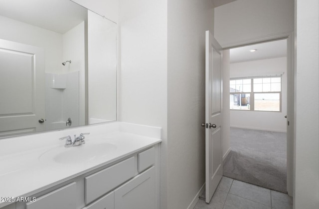 6113 E Artemis Dr, Florence, AZ 85132 - bathroom with vanity, baseboards, and tile patterned flooring