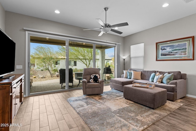 4244 Sawbuck Way, Wickenburg, AZ 85390 - living room with baseboards, light wood-style floors, recessed lighting, and a ceiling fan
