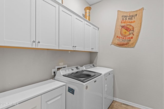 4244 Sawbuck Way, Wickenburg, AZ 85390 - laundry room with cabinet space, washing machine and dryer, baseboards, and light wood-type flooring