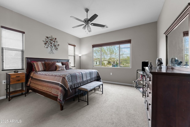 4244 Sawbuck Way, Wickenburg, AZ 85390 - bedroom with visible vents, baseboards, light colored carpet, and ceiling fan