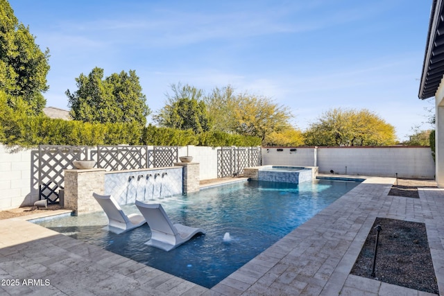 view of pool with a patio area, a fenced backyard, and a pool with connected hot tub