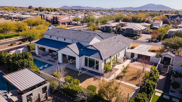 bird's eye view with a mountain view and a residential view