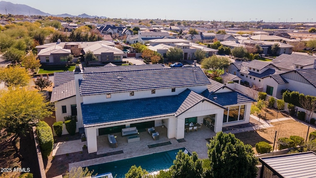 bird's eye view with a residential view and a mountain view